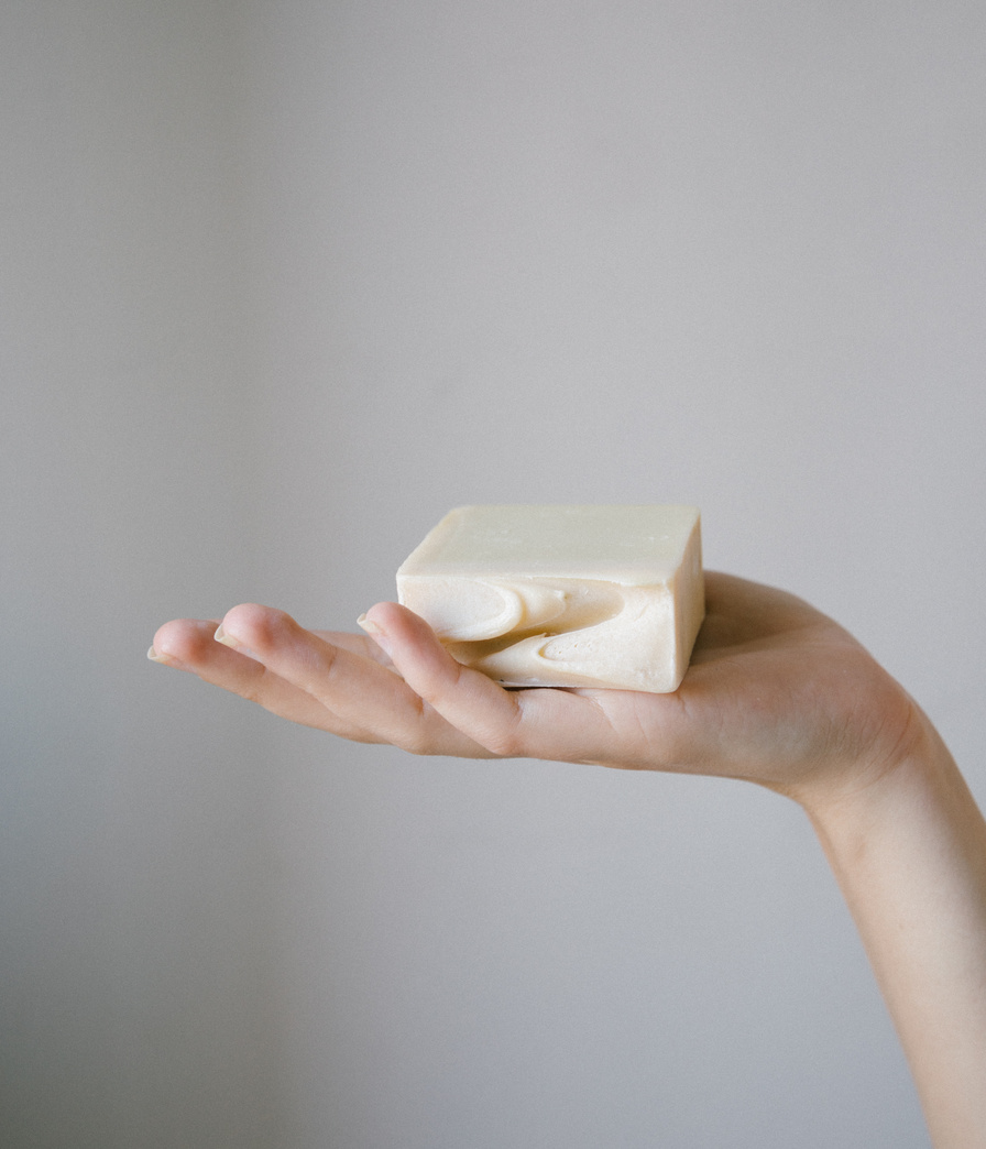 A Person Holding a Soap Bar